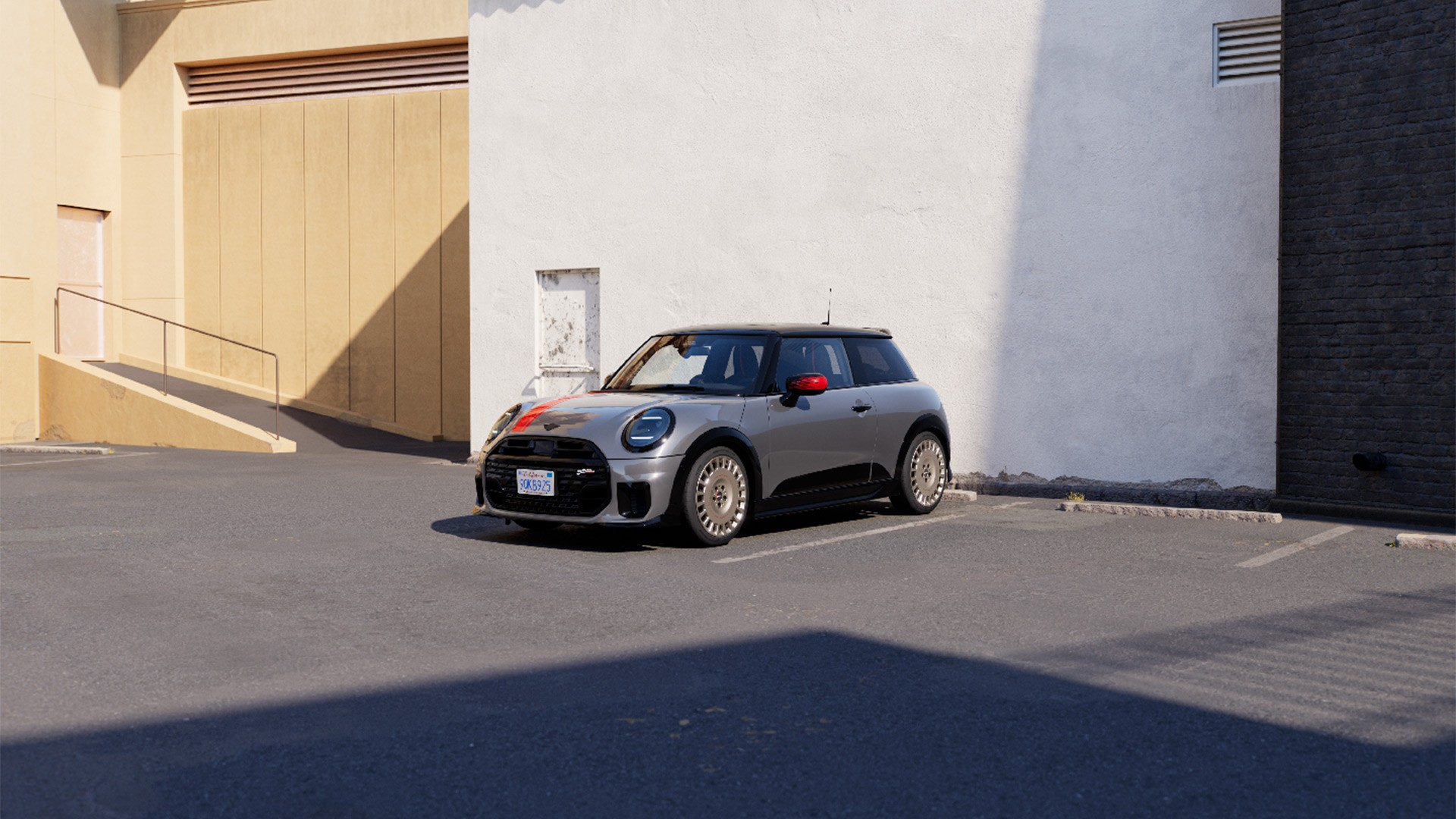 MINI Convertible in Silver boasting sporty JCW styling products including MINI JCW mirror caps, sport stripes and winglet.